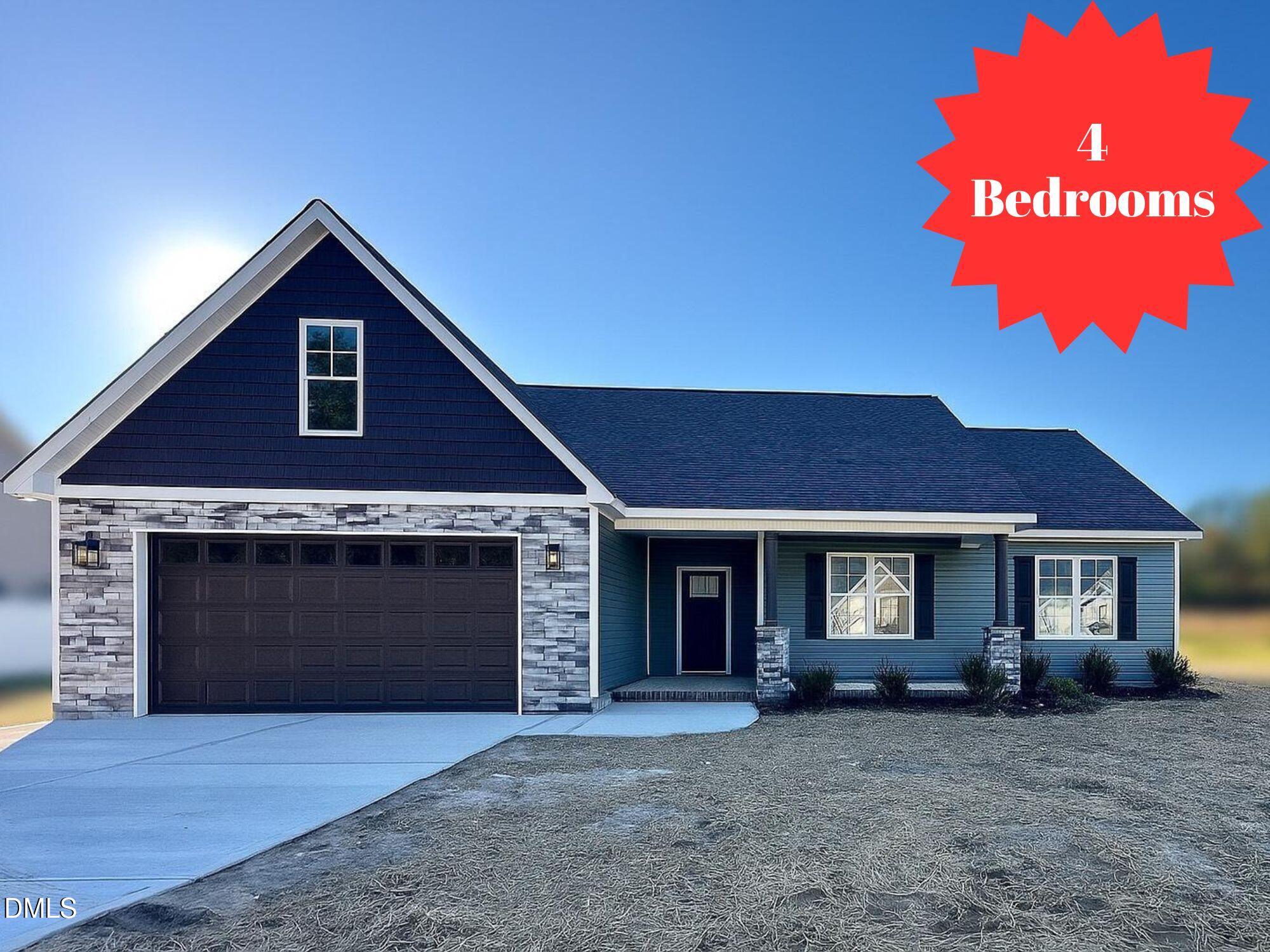 a front view of a house with yard