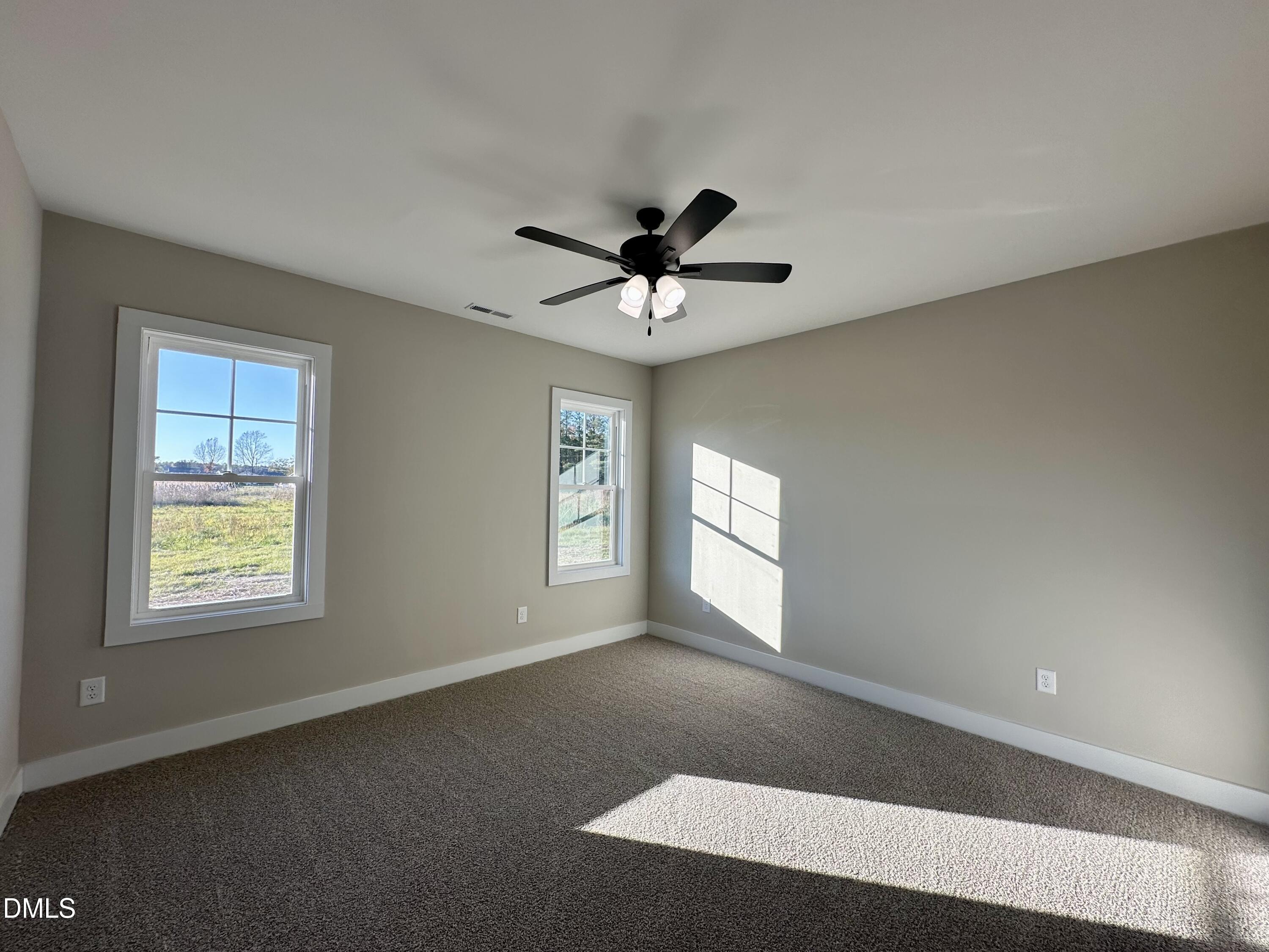 165 Bay Valley Road Kenly, NC 27542 - Photo 10 of 23 a view of an empty room with a window