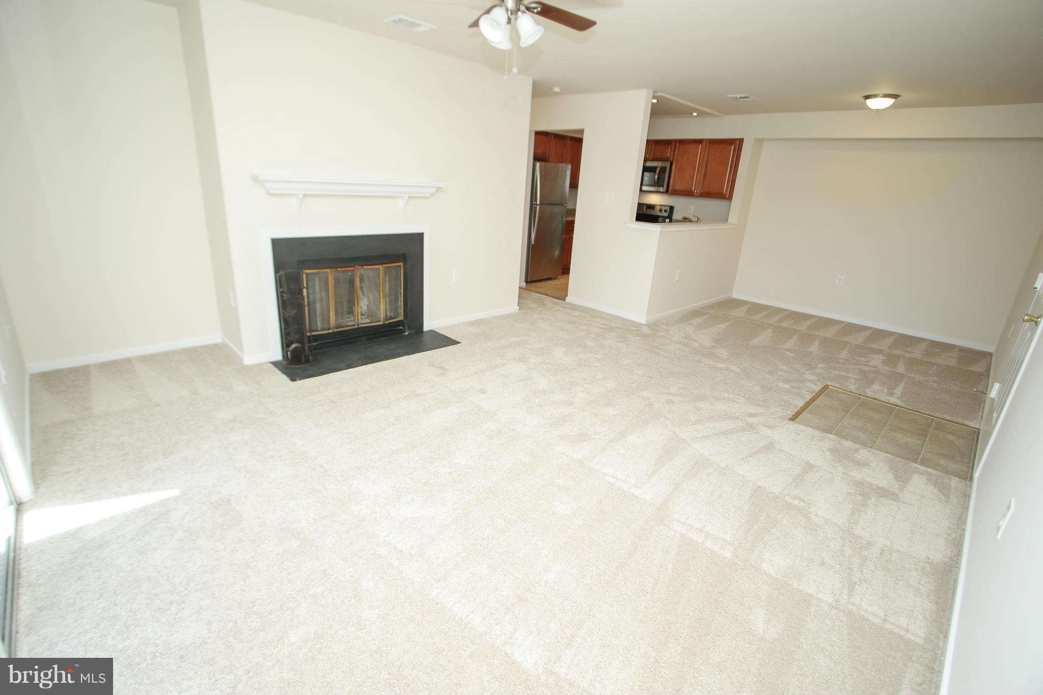 7709 Lexton Place, Unit 47 Springfield, VA 22152 - Photo 9 of 30 Living Room with Fireplace!