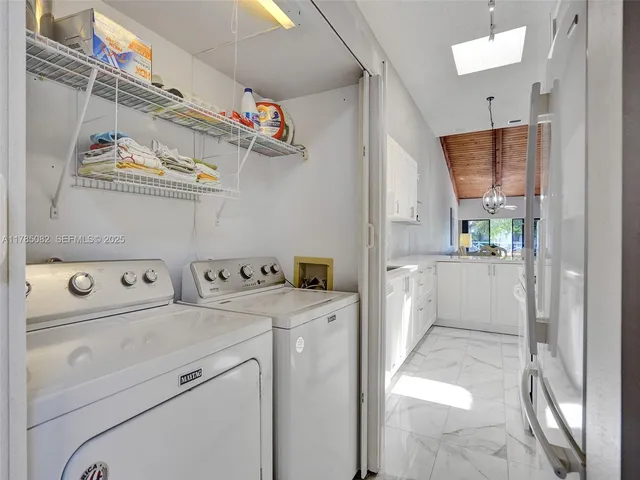 a view of swimming pool with seating space