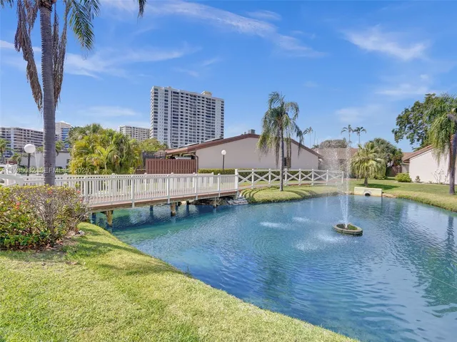 a view of a garden with a deck