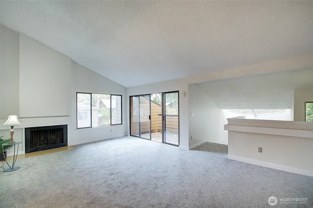 a view of livingroom with furniture and fireplace