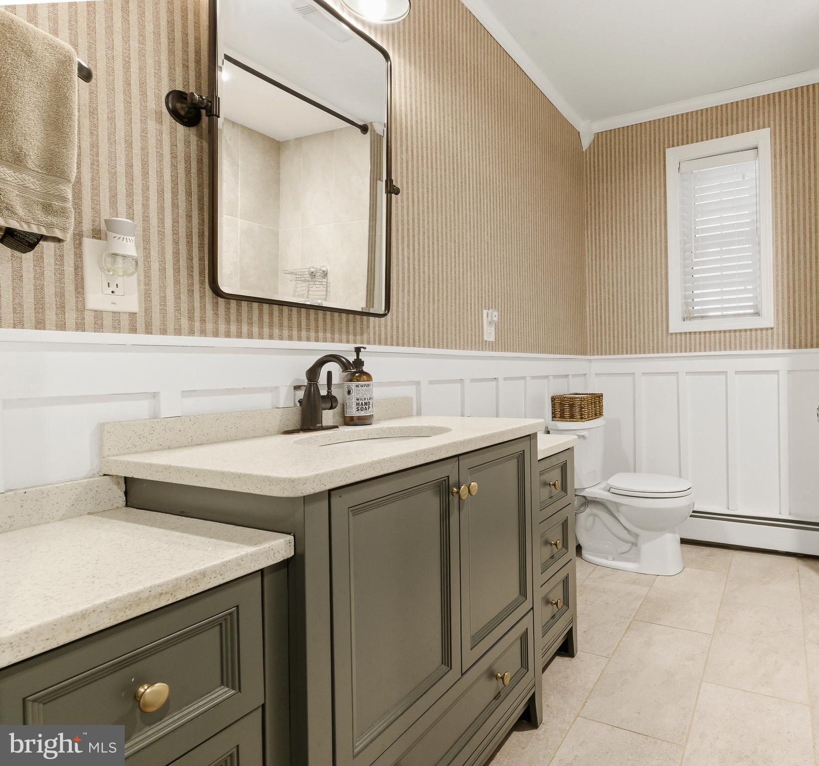 76 Pancoast Boulevard Delran, NJ 08075 - Photo 11 of 36 a bathroom with a sink toilet and mirror