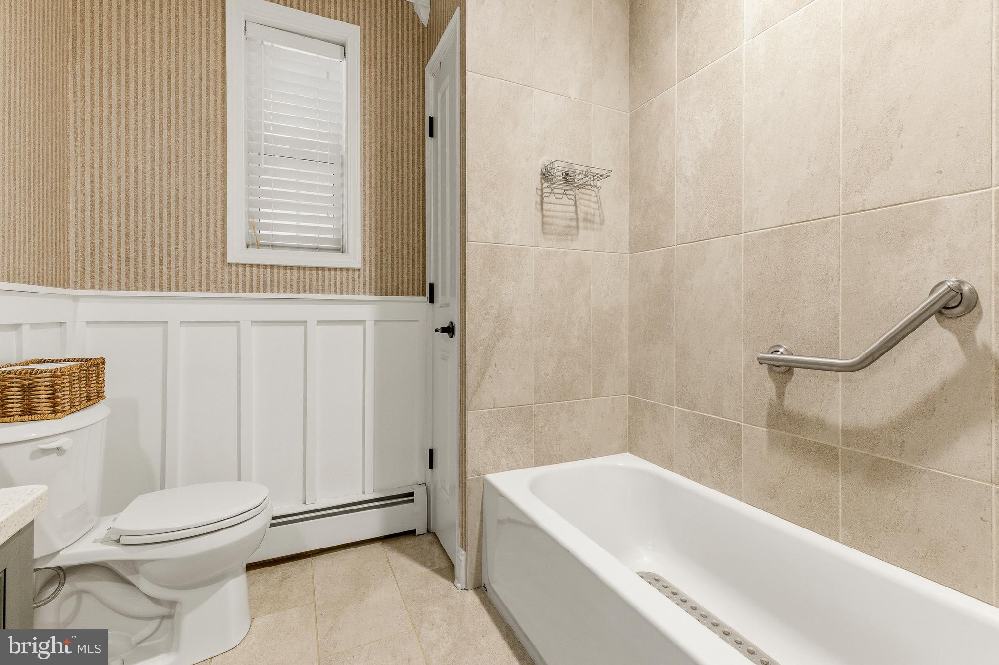 76 Pancoast Boulevard Delran, NJ 08075 - Photo 12 of 36 a bathroom with a toilet a sink and bathtub