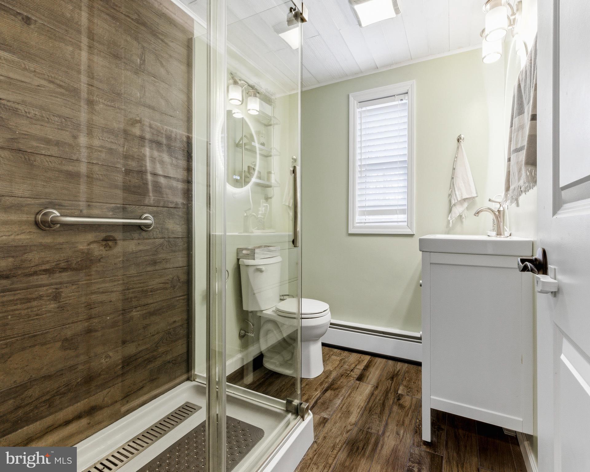 76 Pancoast Boulevard Delran, NJ 08075 - Photo 17 of 36 a bathroom with a sink toilet and shower