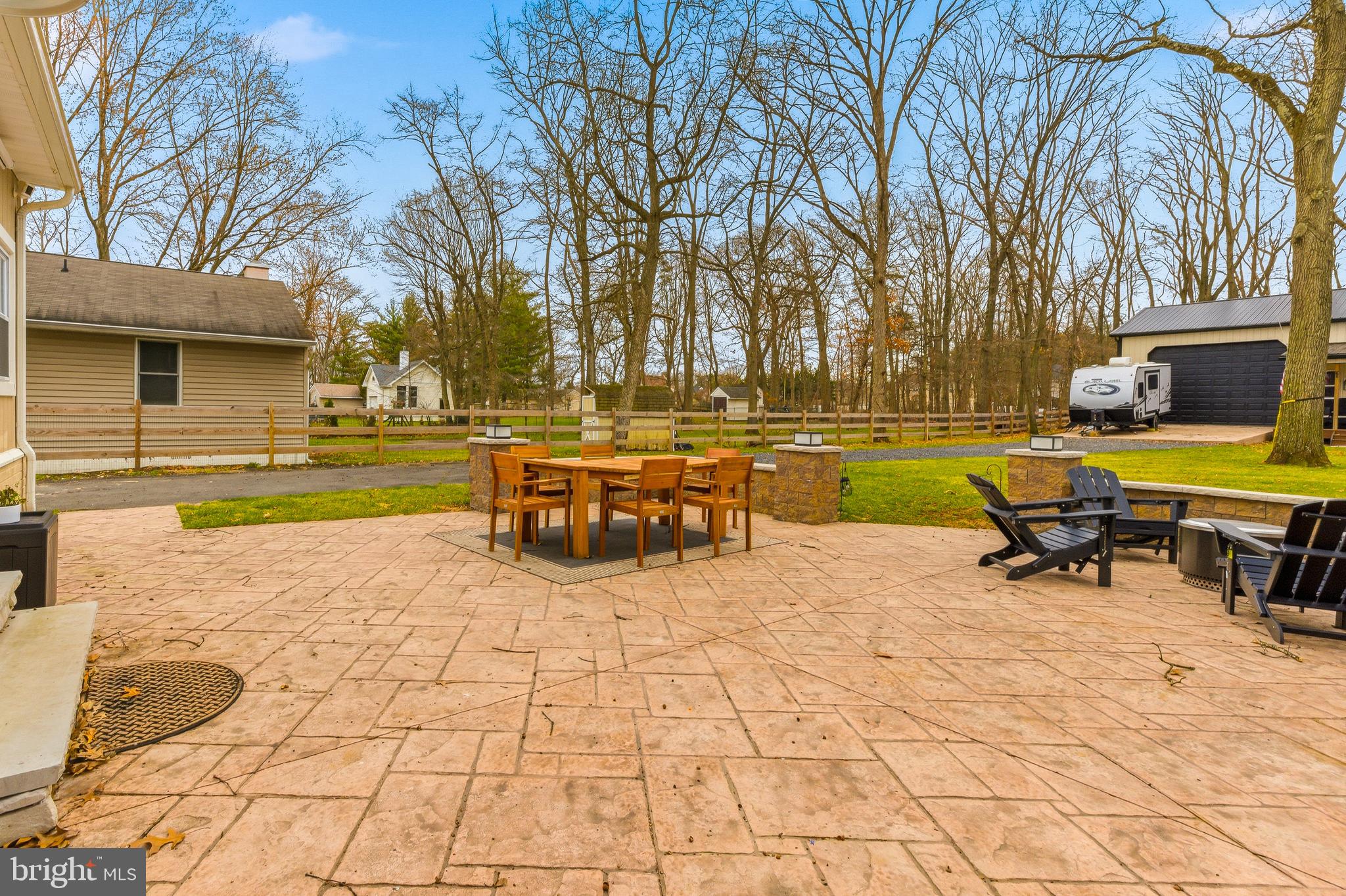 76 Pancoast Boulevard Delran, NJ 08075 - Photo 25 of 36 a view of a swimming pool with lawn chairs under an umbrella