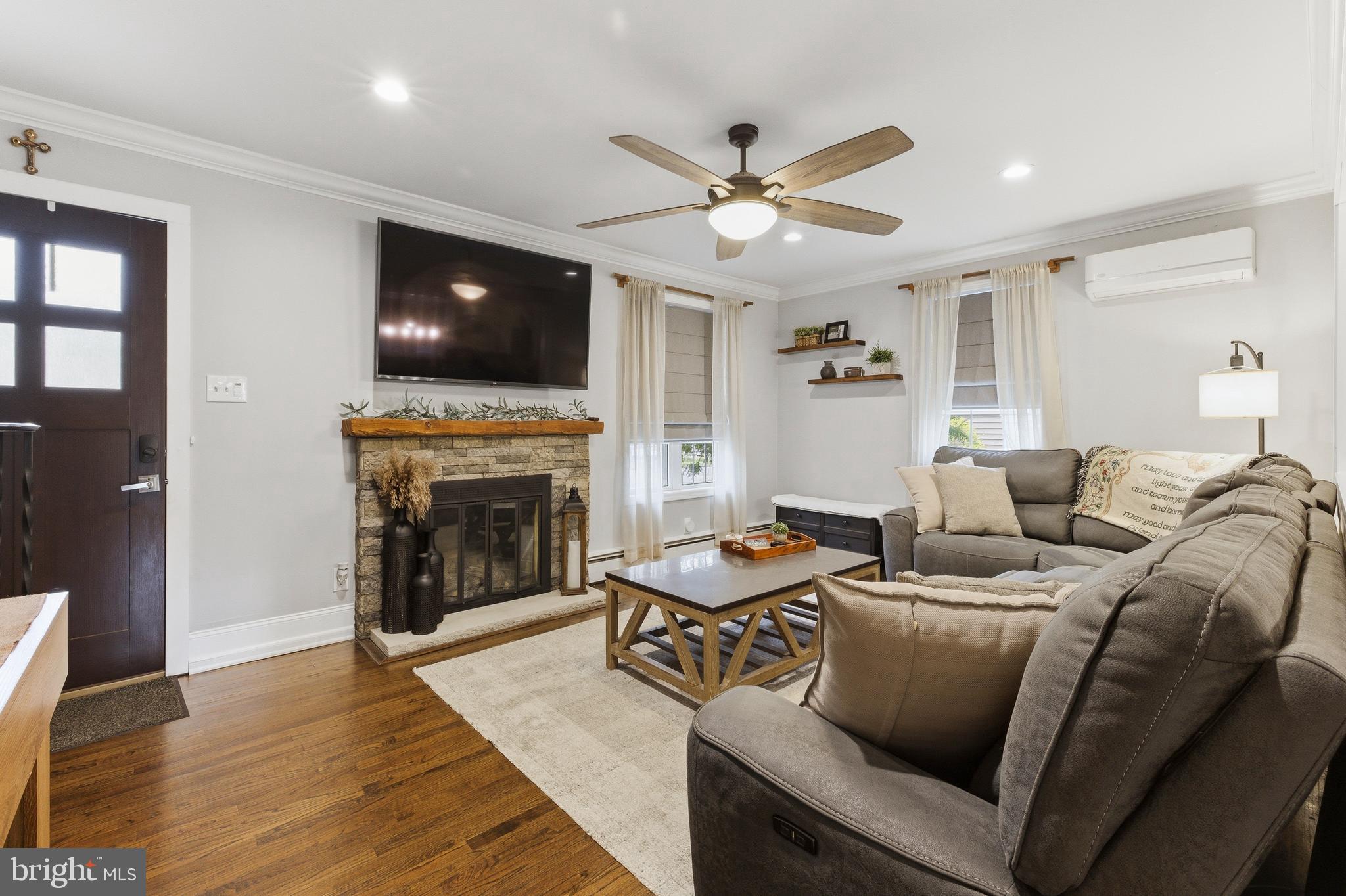 76 Pancoast Boulevard Delran, NJ 08075 - Photo 4 of 36 a living room with furniture and a fireplace