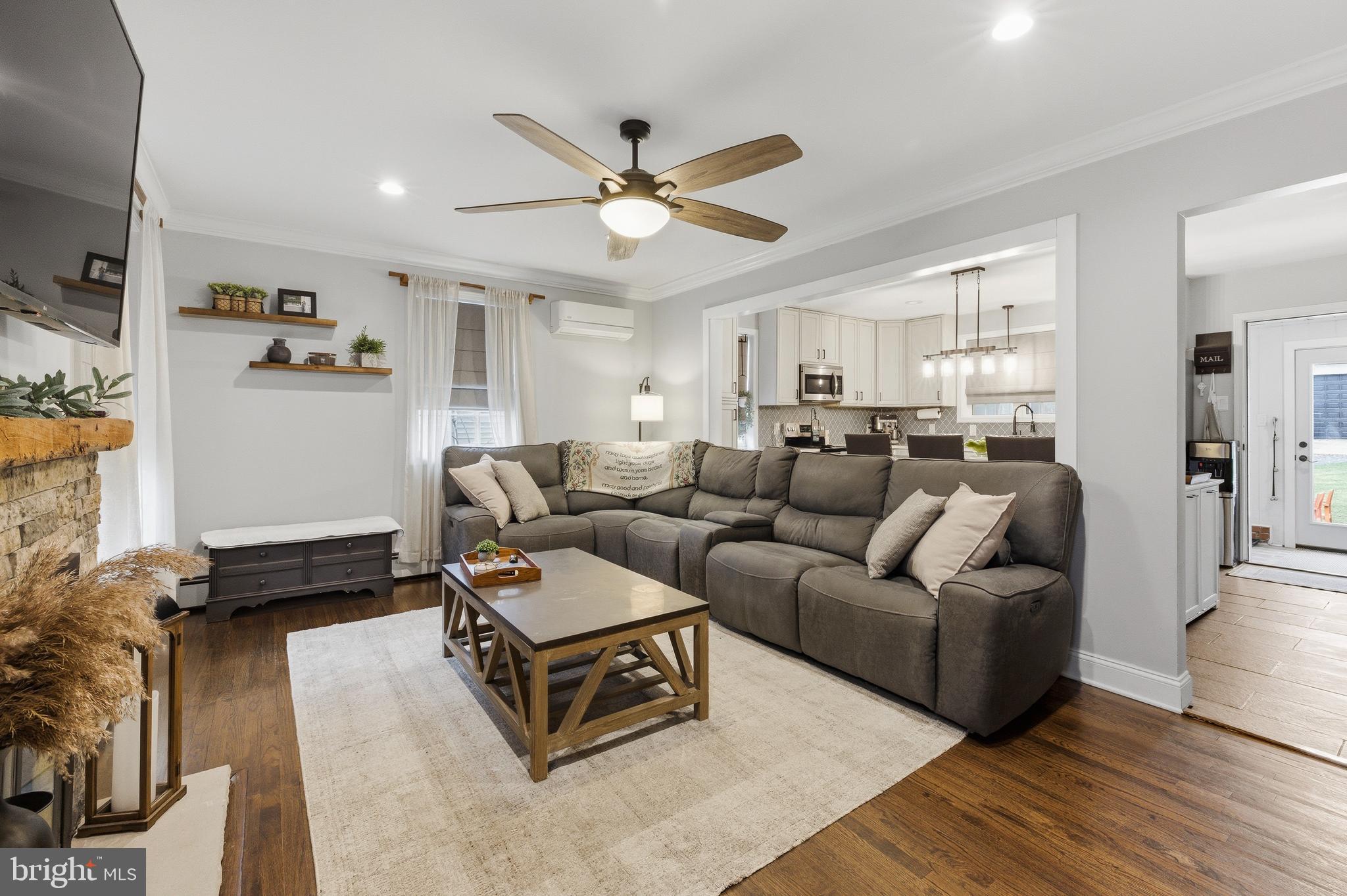 76 Pancoast Boulevard Delran, NJ 08075 - Photo 5 of 36 a living room with furniture and a chandelier