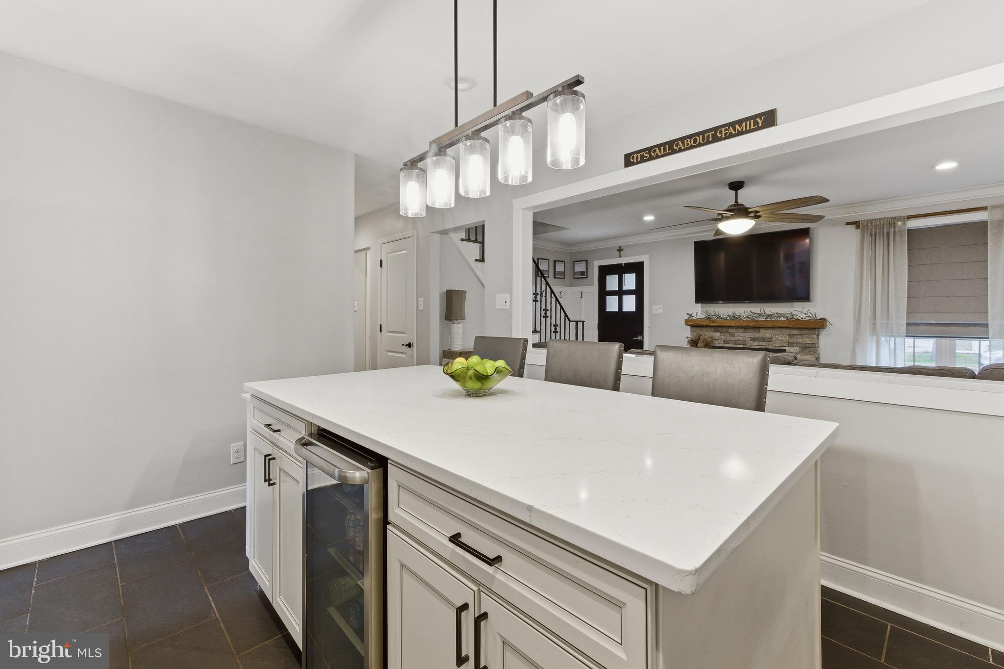 76 Pancoast Boulevard Delran, NJ 08075 - Photo 7 of 36 a large white kitchen with a large island oven a stove and white cabinets