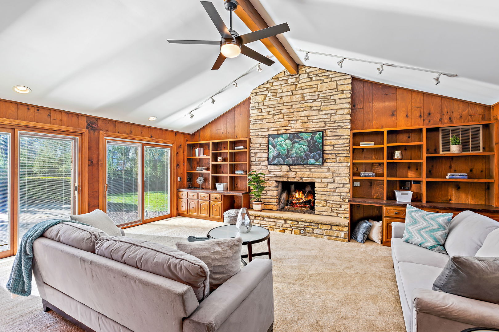 2748 Shannon Road Northbrook, IL 60062 - Photo 9 of 23 a living room with fireplace furniture and a large window