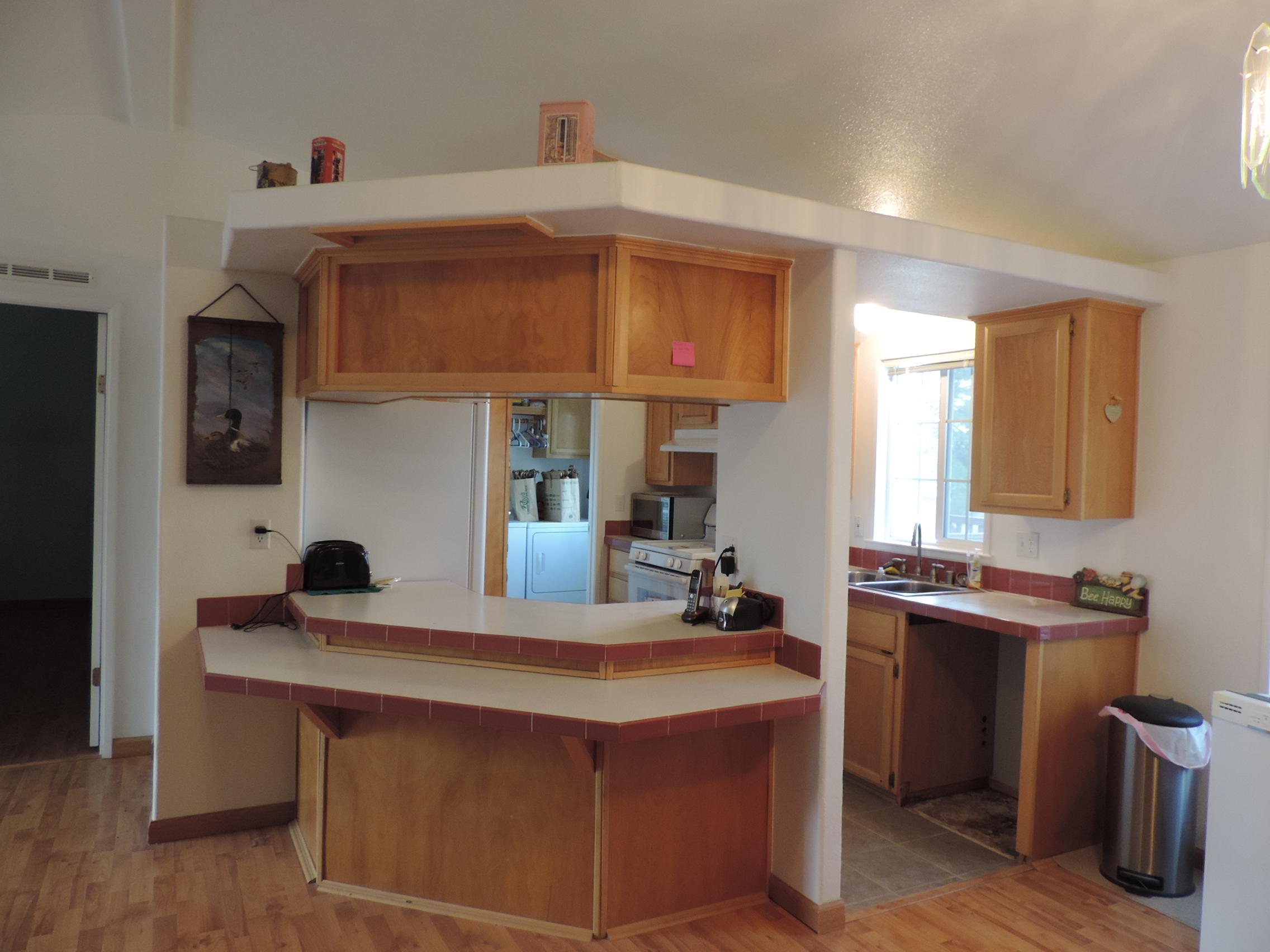 4800 Co Road Adin, CA 96006 - Photo 20 of 27 a kitchen with a sink cabinets and window