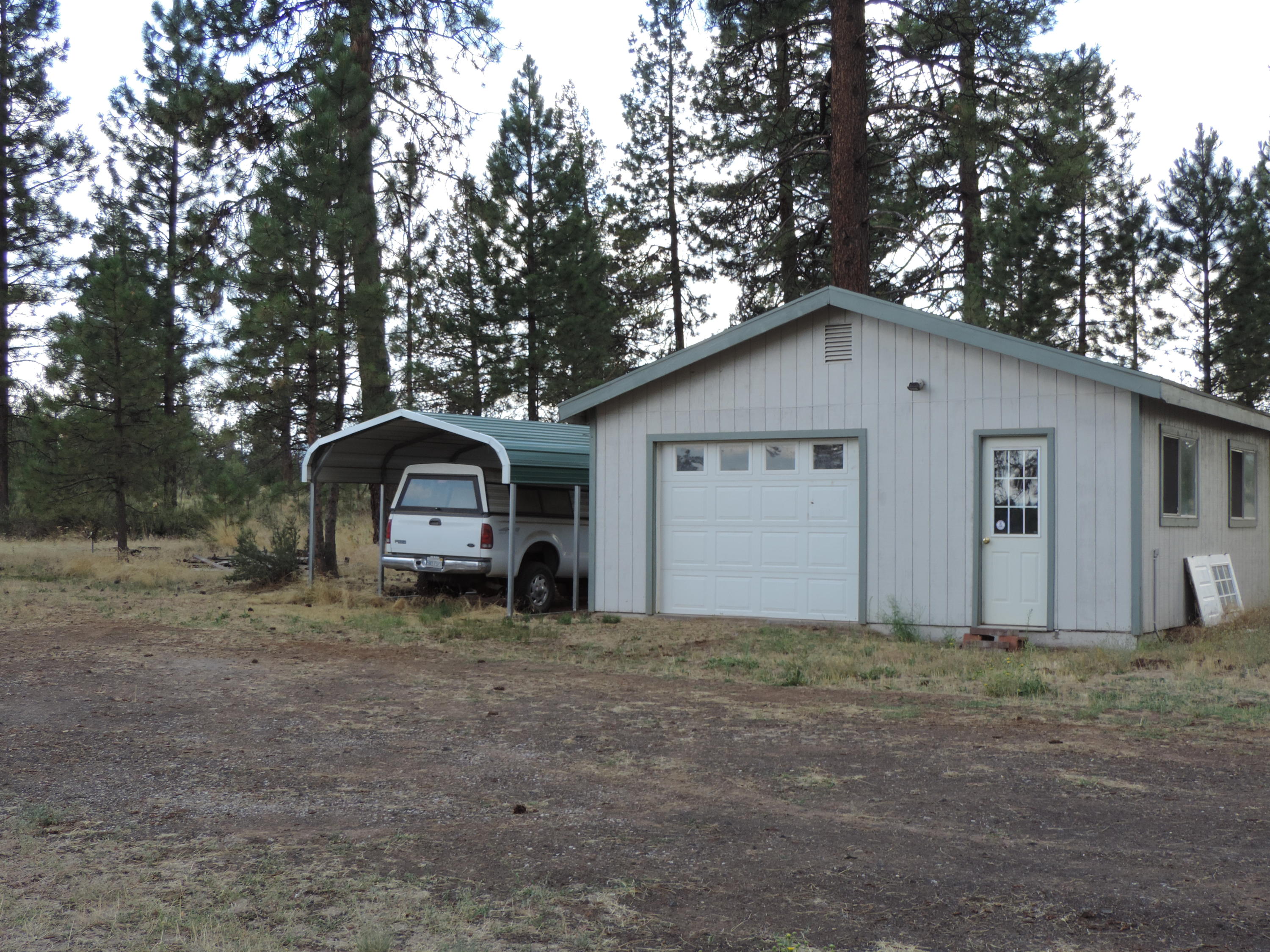 4800 Co Road Adin, CA 96006 - Photo 2 of 27 a view of a house with a yard
