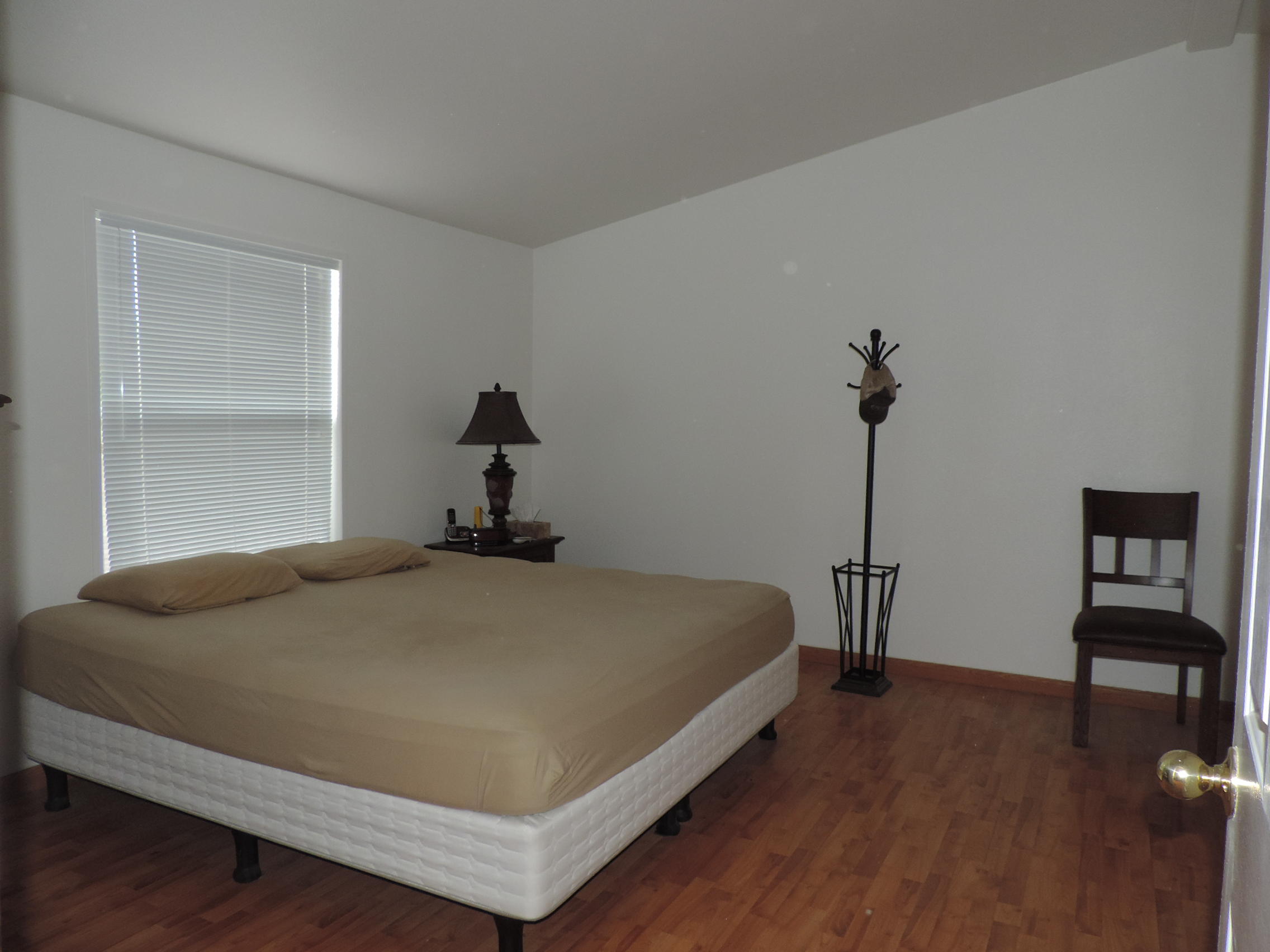4800 Co Road Adin, CA 96006 - Photo 24 of 27 a bedroom with a bed and wooden floor