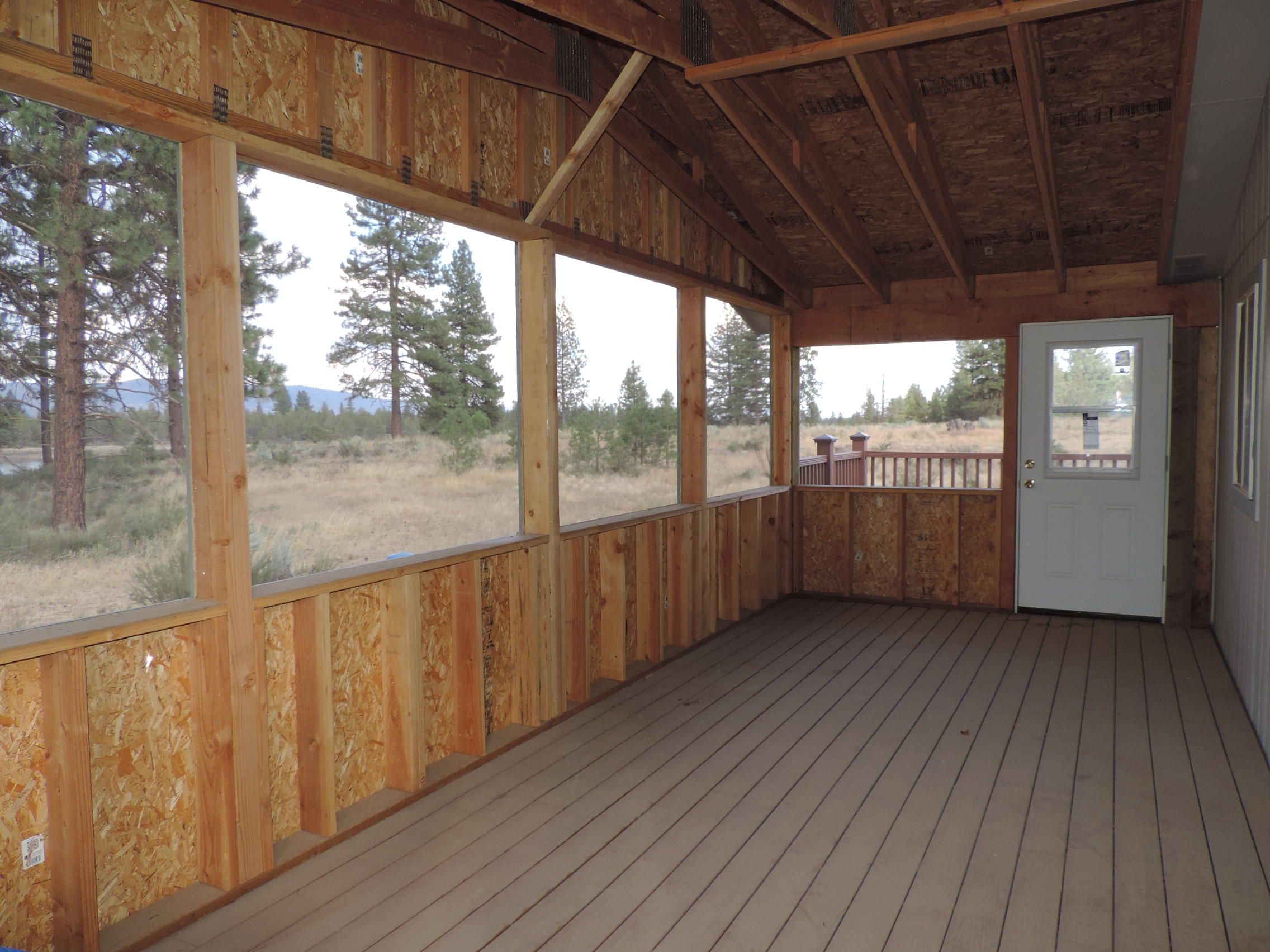 4800 Co Road Adin, CA 96006 - Photo 27 of 27 a view of a porch with wooden floor and outdoor space