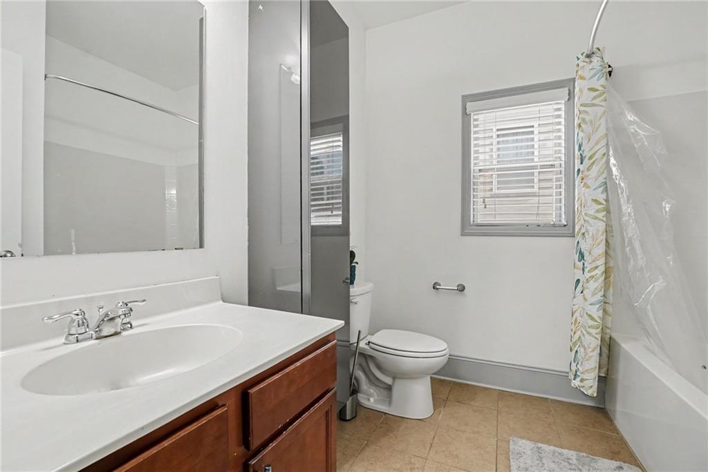 566 Olympic Way Acworth, GA 30102 - Photo 33 of 38 a bathroom with a sink toilet and shower
