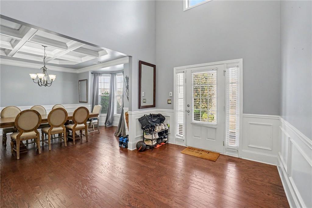 566 Olympic Way Acworth, GA 30102 - Photo 8 of 38 a living room with furniture and wooden floor