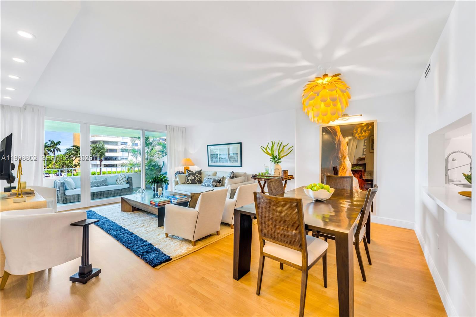 199 Ocean Ln Drive, Unit 306 Key Biscayne, FL 33149 - Photo 2 of 15 a living room with furniture and a table