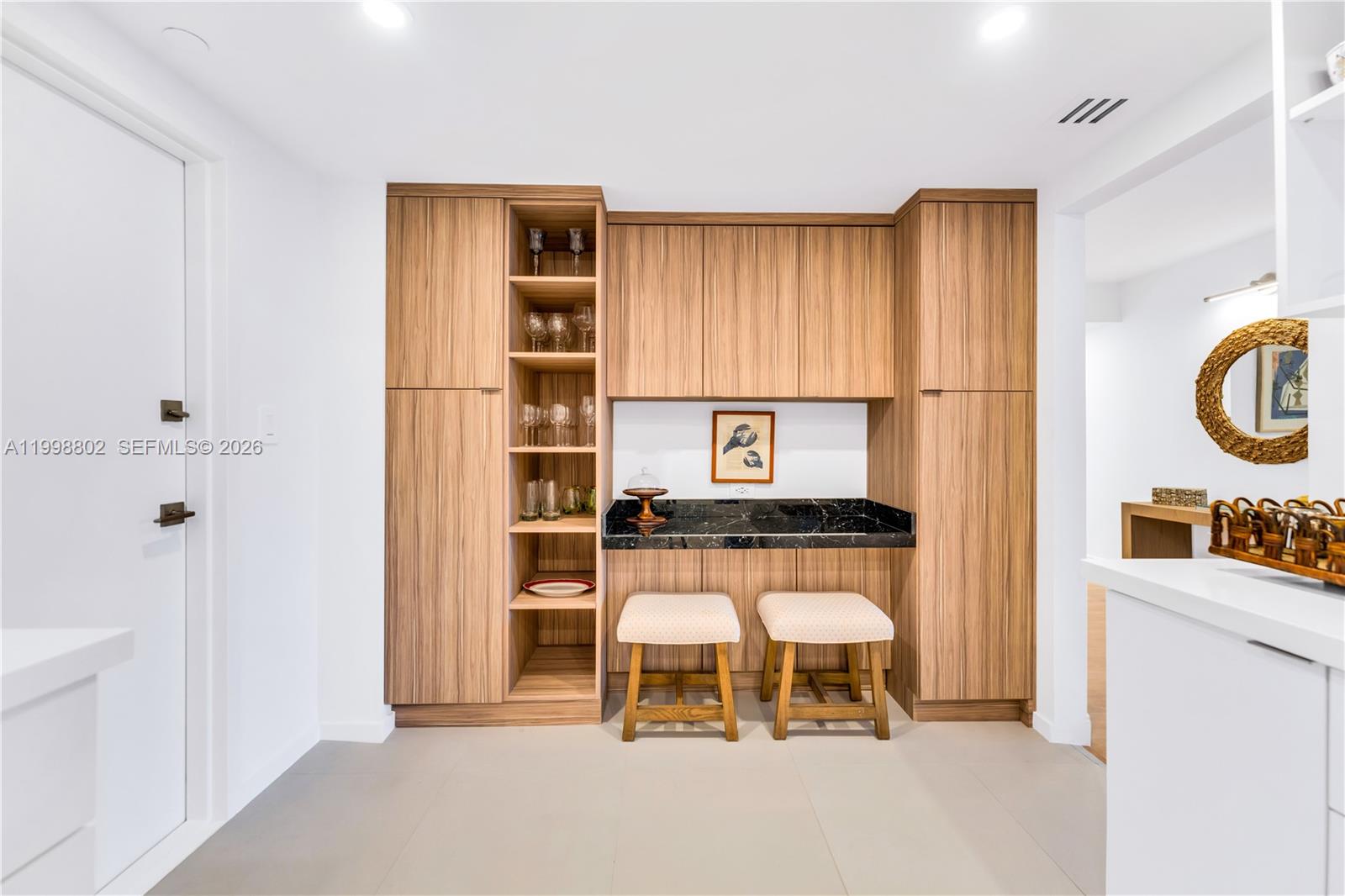 199 Ocean Ln Drive, Unit 306 Key Biscayne, FL 33149 - Photo 6 of 15 a living room with a window and a table