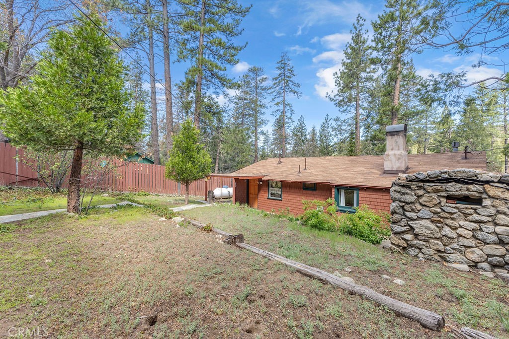53705 Country Club Drive Idyllwild, CA 92549 - Photo 21 of 26 a aerial view of a house with a yard and large trees