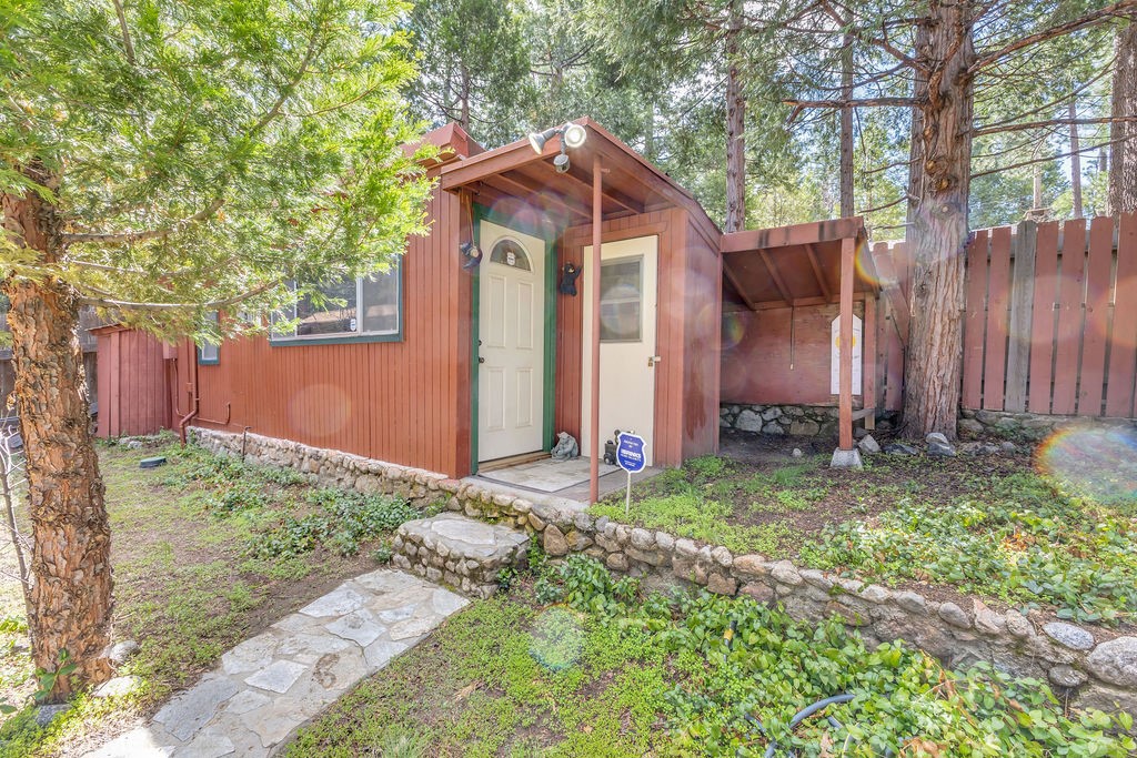 53705 Country Club Drive Idyllwild, CA 92549 - Photo 22 of 26 a front view of a house with garden