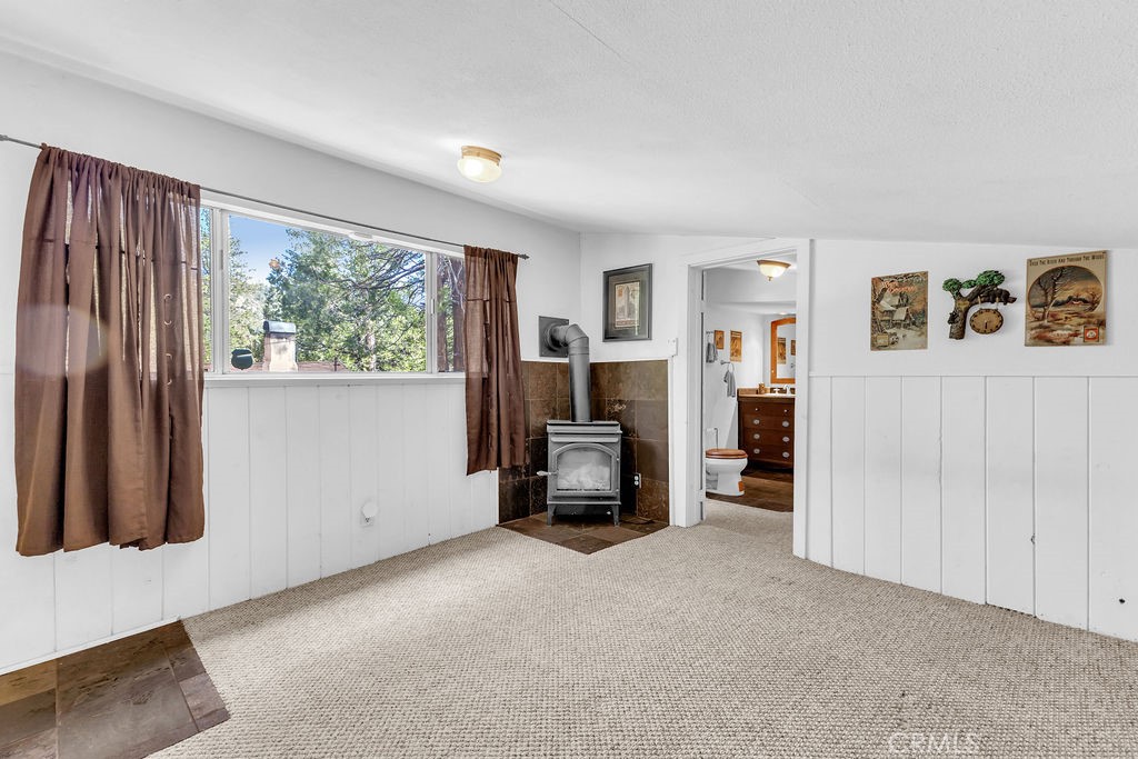 53705 Country Club Drive Idyllwild, CA 92549 - Photo 24 of 26 a view of a livingroom with furniture and windows