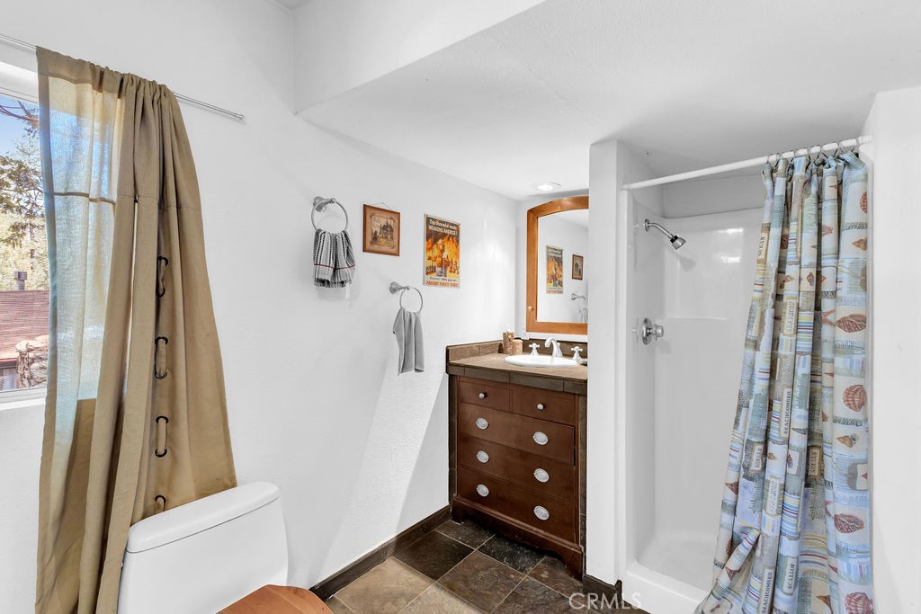 53705 Country Club Drive Idyllwild, CA 92549 - Photo 26 of 26 a walk in closet with wooden floor