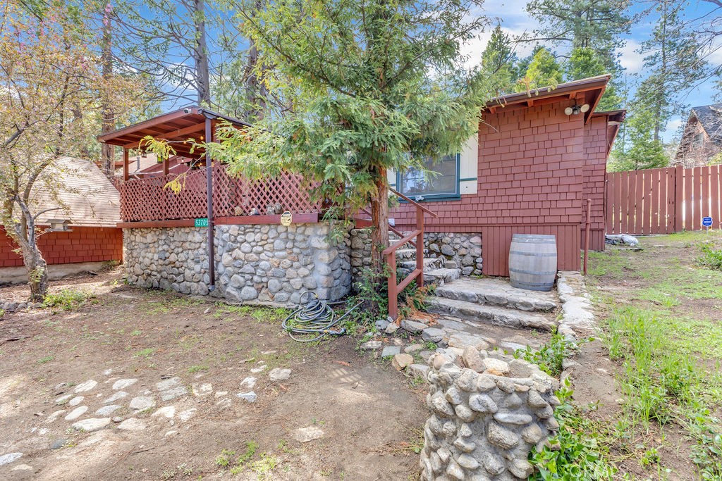 53705 Country Club Drive Idyllwild, CA 92549 - Photo 4 of 26 a view of a yard with an outdoor and trees