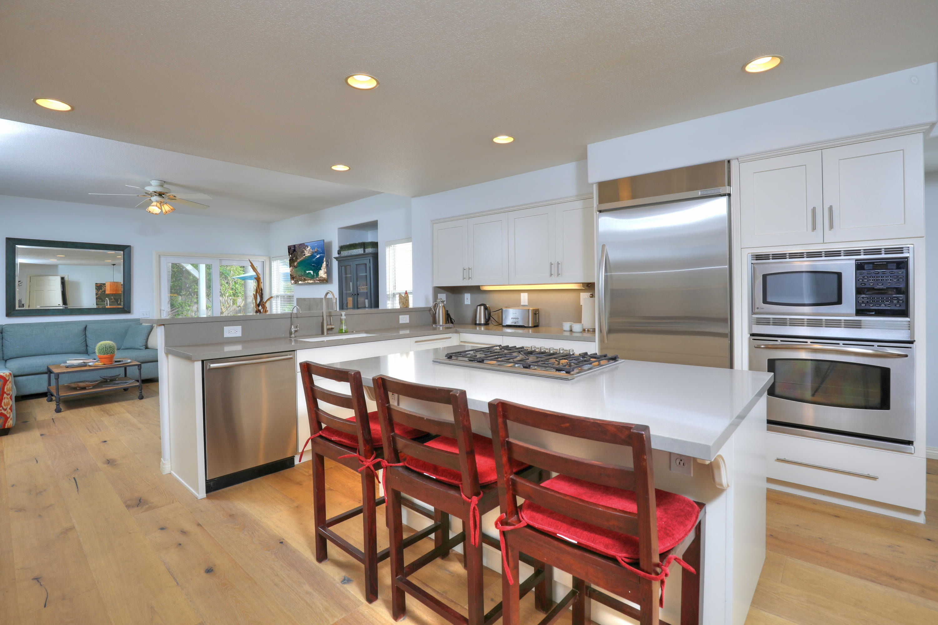 3713 Hitchcock Ranch Road Santa Barbara, CA 93105 - Photo 15 of 28 a kitchen with a stove a refrigerator and a stove top oven