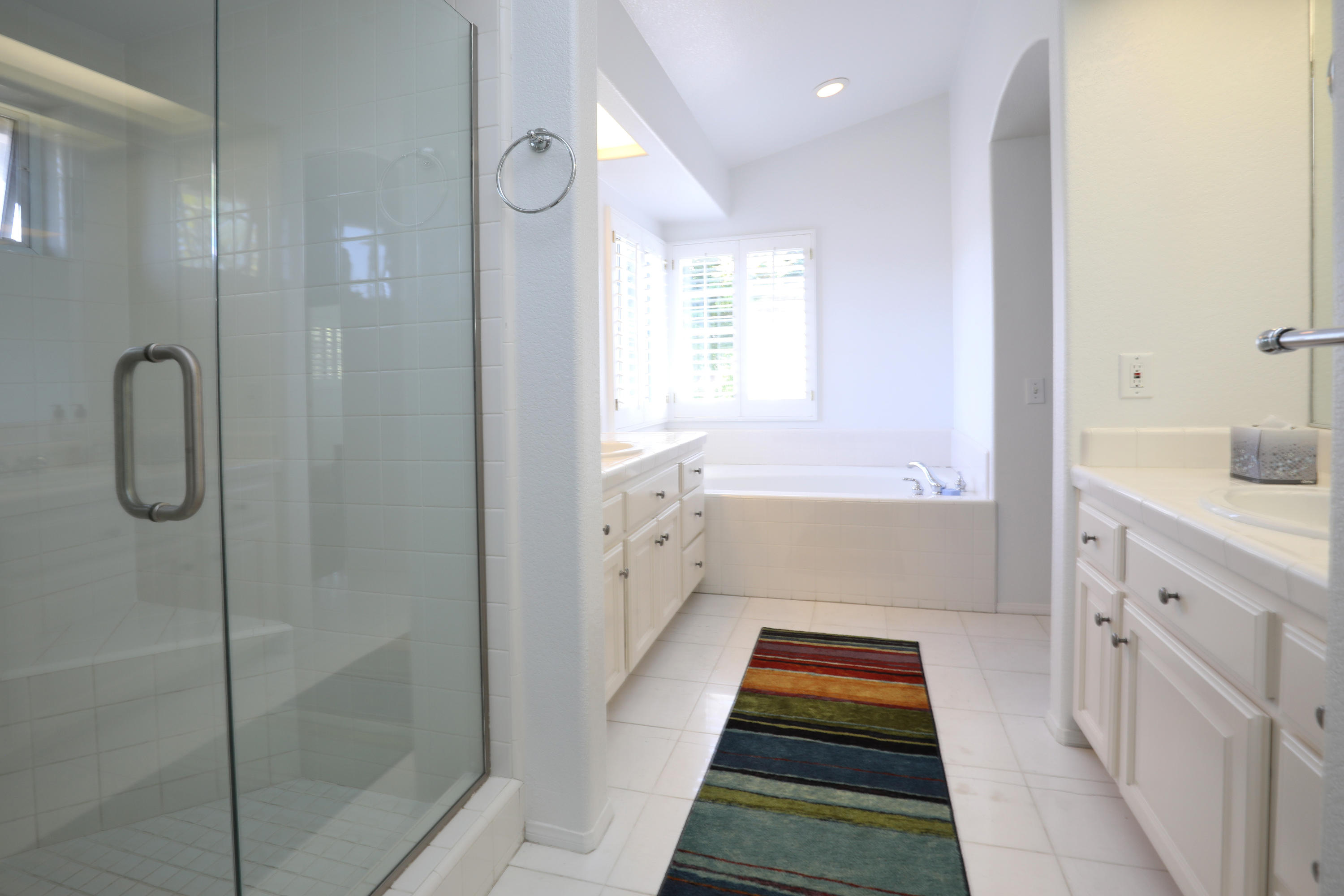 3713 Hitchcock Ranch Road Santa Barbara, CA 93105 - Photo 20 of 28 a bathroom with a tub sink and shower