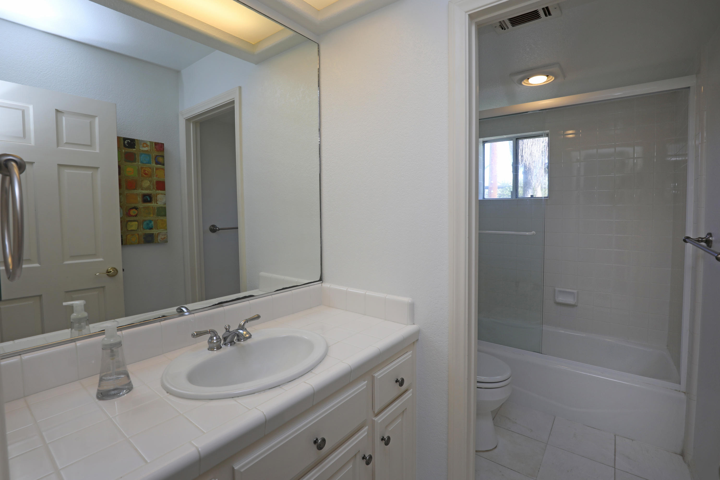 3713 Hitchcock Ranch Road Santa Barbara, CA 93105 - Photo 24 of 28 a bathroom with a sink toilet and shower