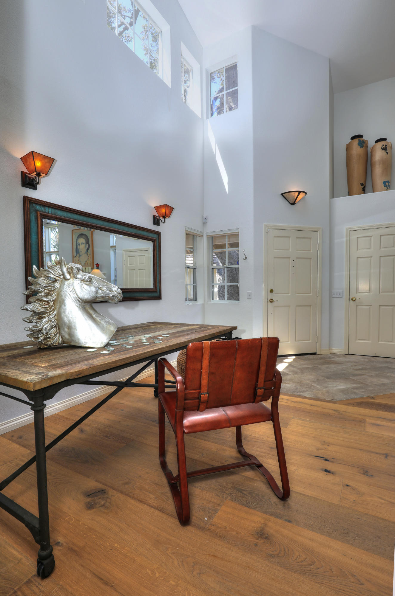 3713 Hitchcock Ranch Road Santa Barbara, CA 93105 - Photo 6 of 28 a room with table chairs and wooden floor