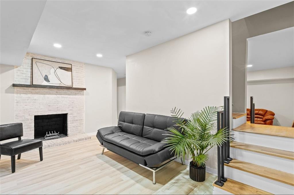 2150 Azalea Circle Decatur, GA 30033 - Photo 13 of 28 a living room with furniture and a fireplace