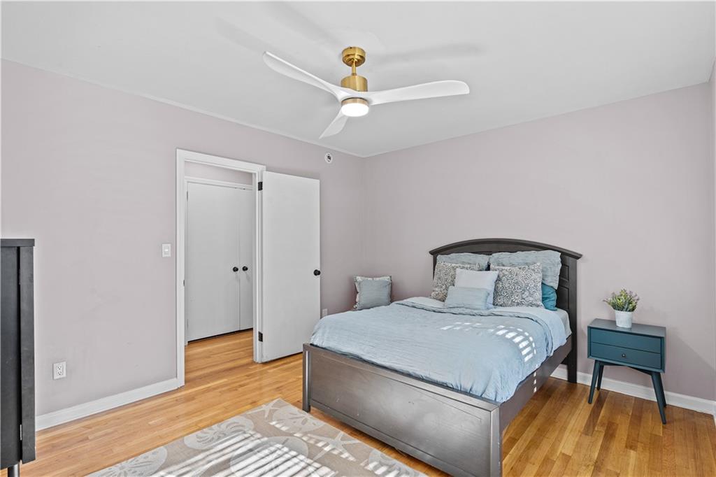 2150 Azalea Circle Decatur, GA 30033 - Photo 15 of 28 a bedroom with a bed and wooden floor