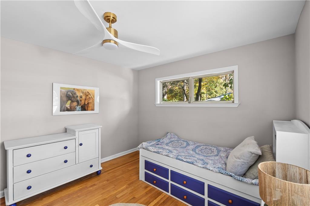 2150 Azalea Circle Decatur, GA 30033 - Photo 17 of 28 a bedroom with a bed and a dresser in it