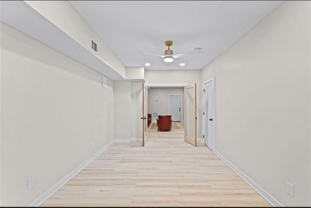 2150 Azalea Circle Decatur, GA 30033 - Photo 20 of 28 a view of a hallway with a chandelier