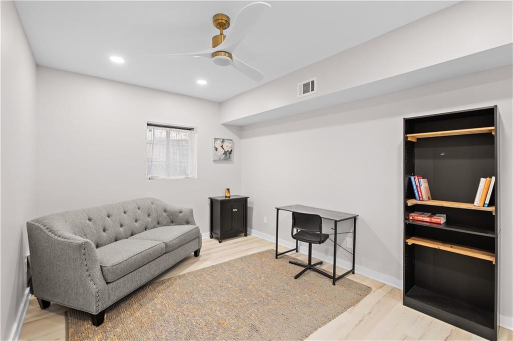 2150 Azalea Circle Decatur, GA 30033 - Photo 24 of 28 a living room with furniture and a rug