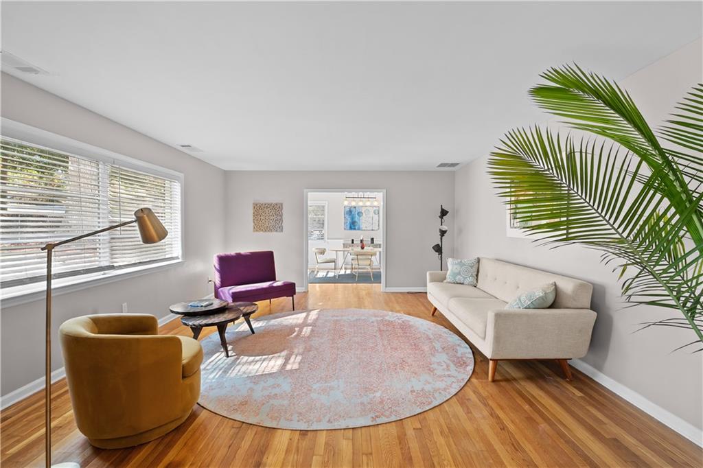 2150 Azalea Circle Decatur, GA 30033 - Photo 5 of 28 a living room with furniture and a wooden floor