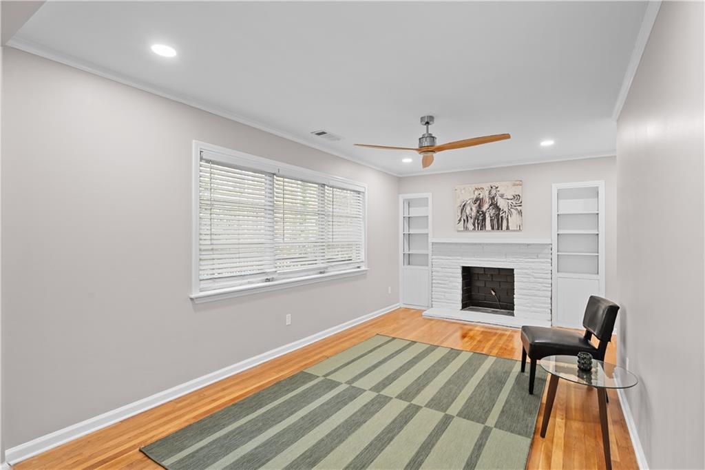 2150 Azalea Circle Decatur, GA 30033 - Photo 10 of 28 a view of a livingroom with a fireplace and wooden floor