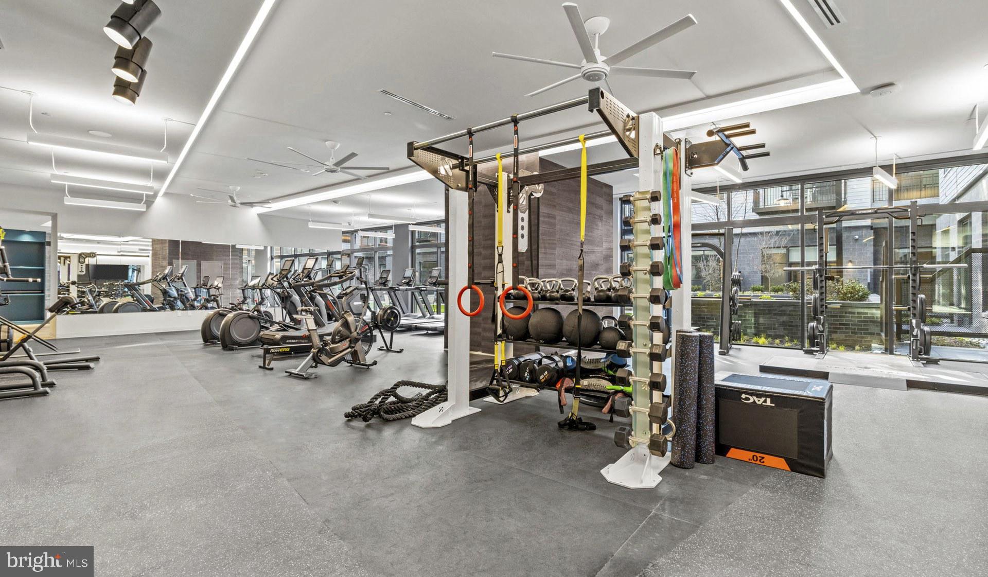 4000 Wisconsin Avenue Northwest, Unit 4K236 Washington, DC 20016 - Photo 4 of 54 a view of a room with gym equipment
