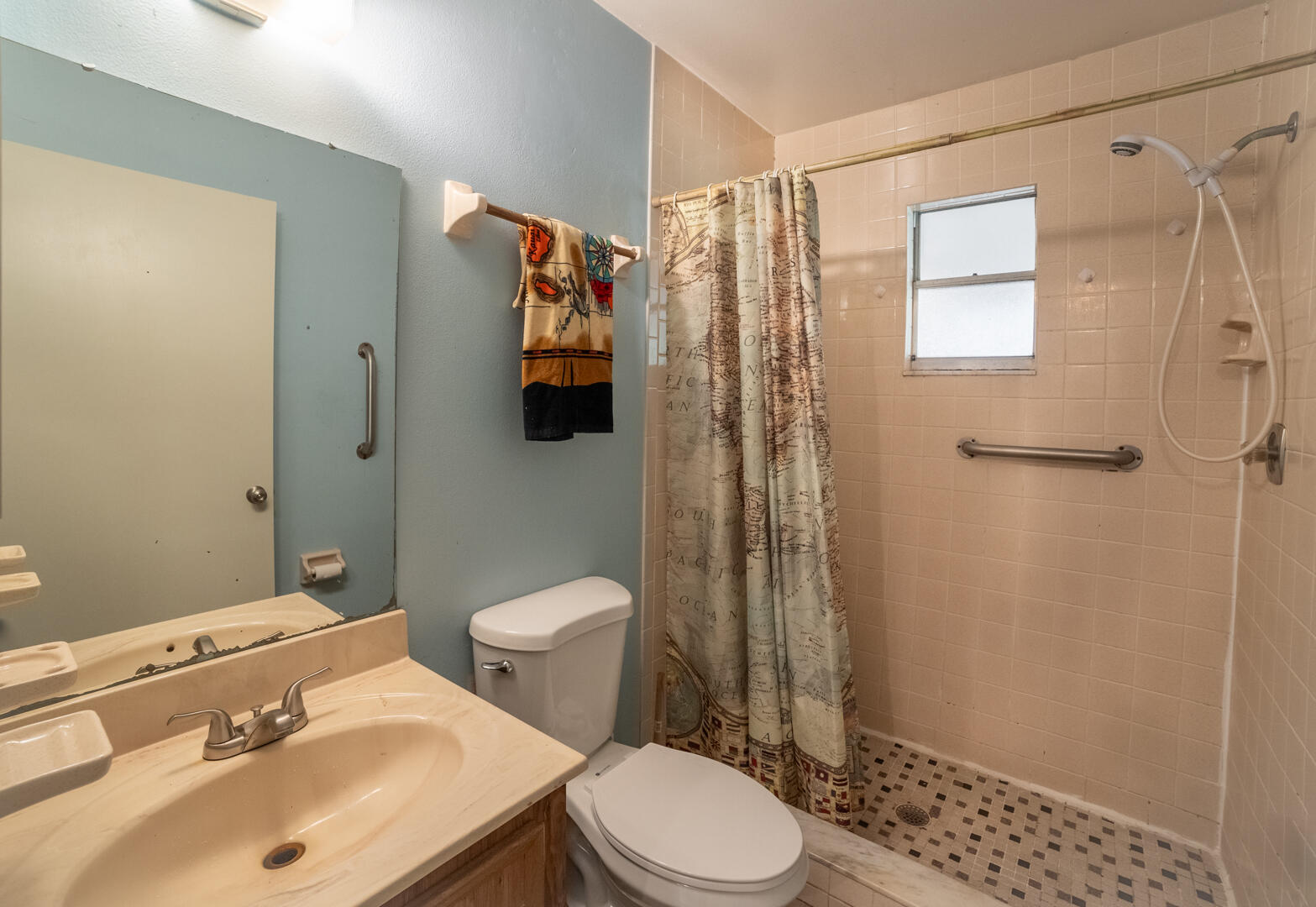 1533 West Powder Horn Road Titusville, FL 32796 - Photo 13 of 29 a bathroom with a sink toilet and shower