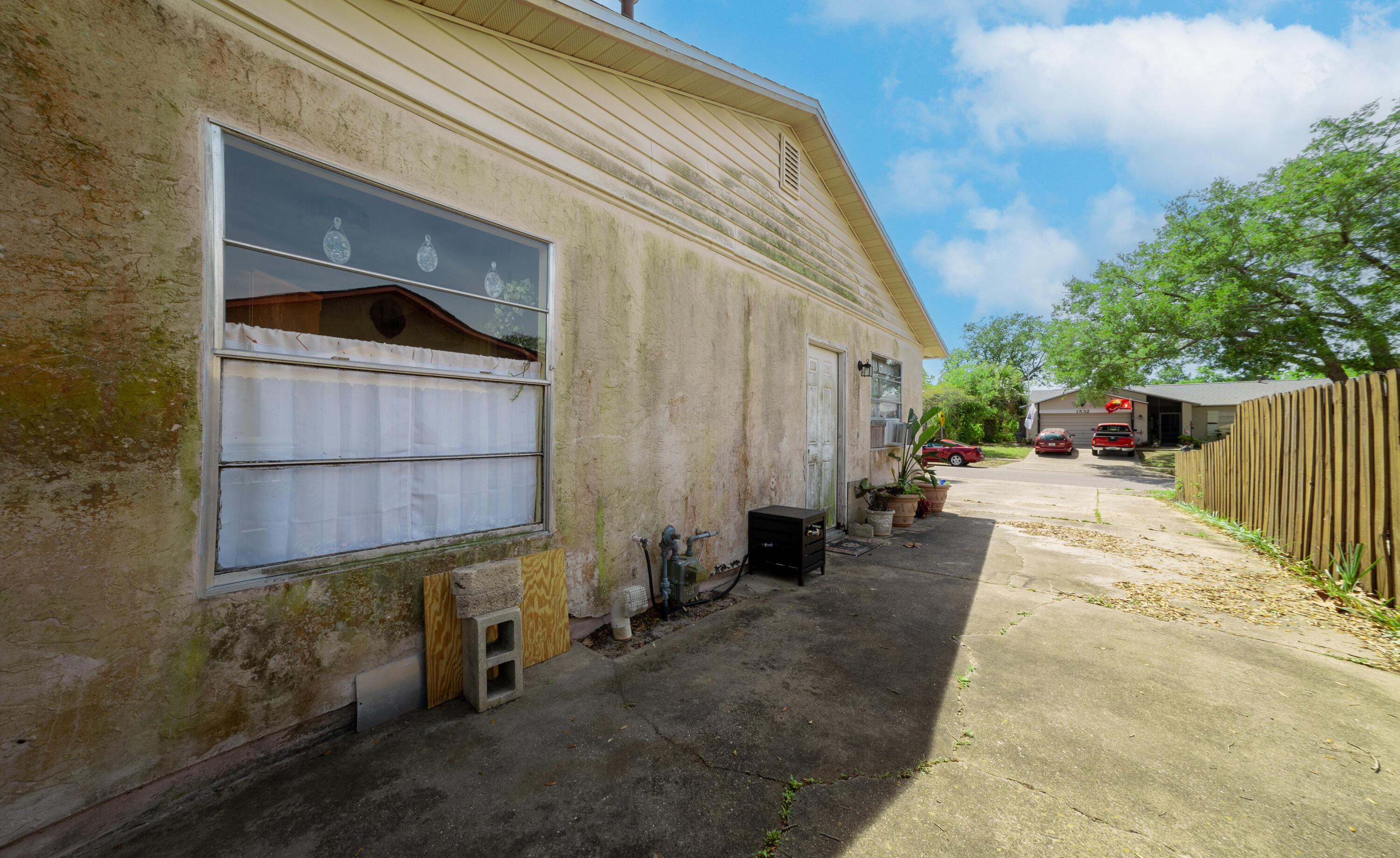 1533 West Powder Horn Road Titusville, FL 32796 - Photo 28 of 29 a view of a back yard of the house