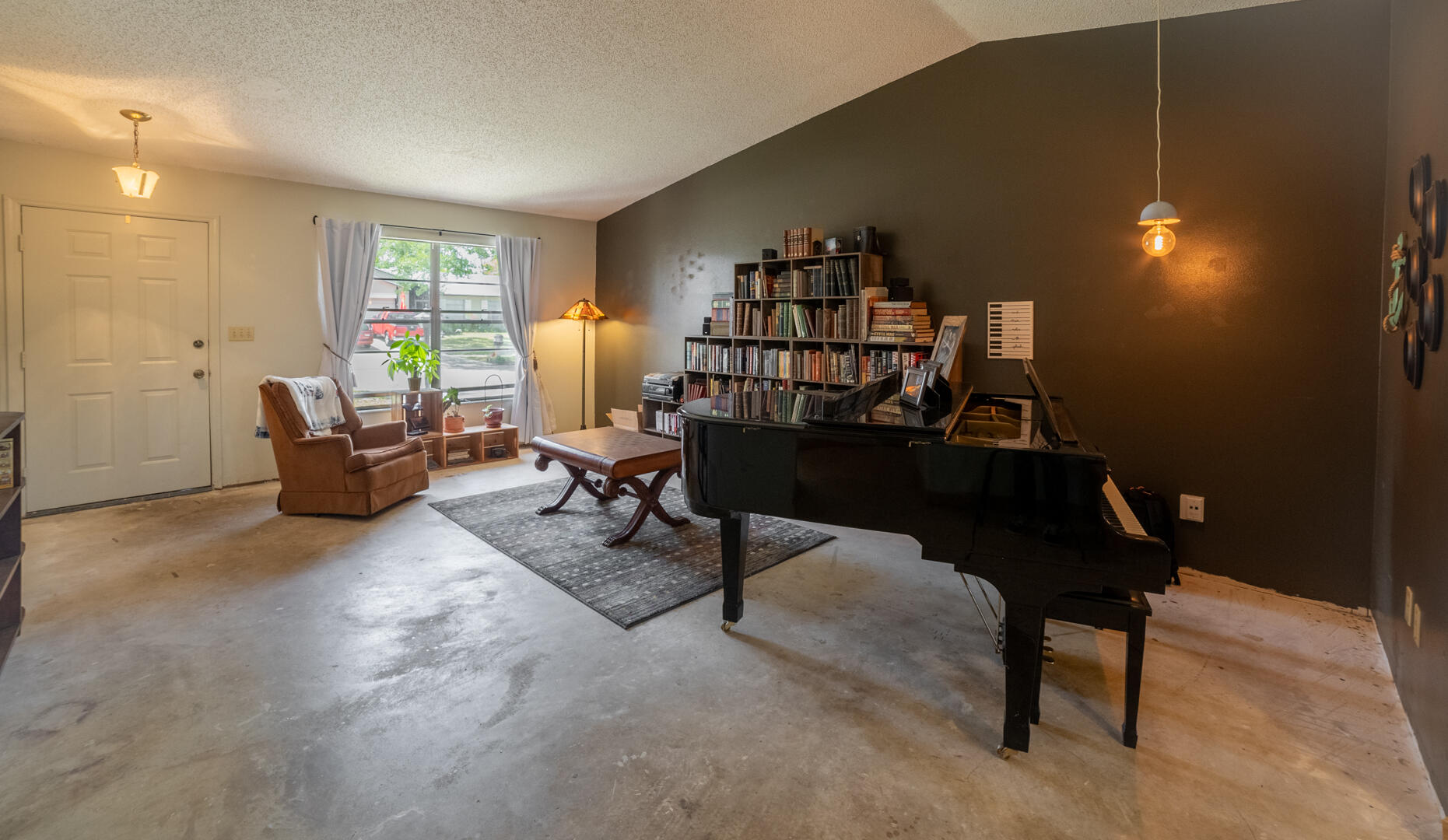 1533 West Powder Horn Road Titusville, FL 32796 - Photo 5 of 29 a living room with furniture and a window