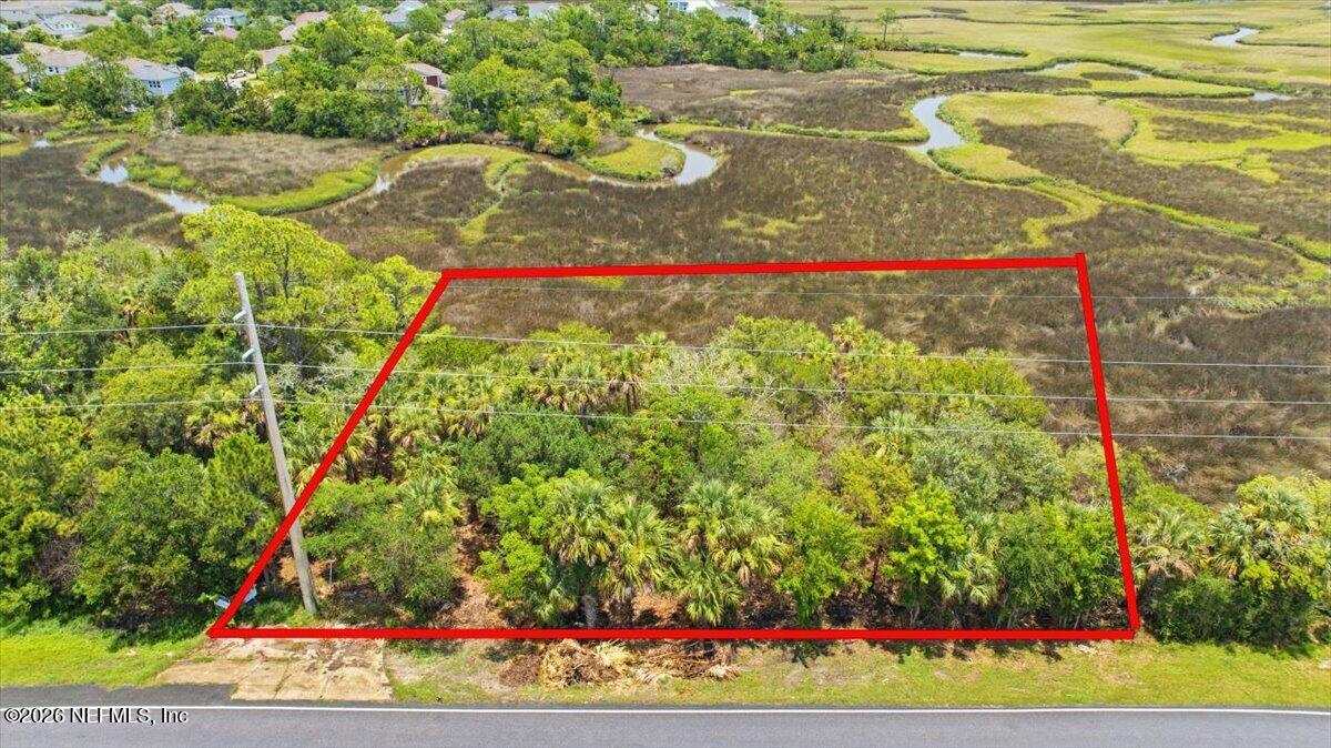 3258 Lewis Speedway St. Augustine, FL 32084 - Photo 7 of 10 a view of a yard with an outdoor space