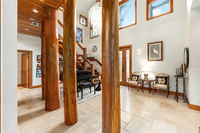 a view of a couches and a fireplace in the living room