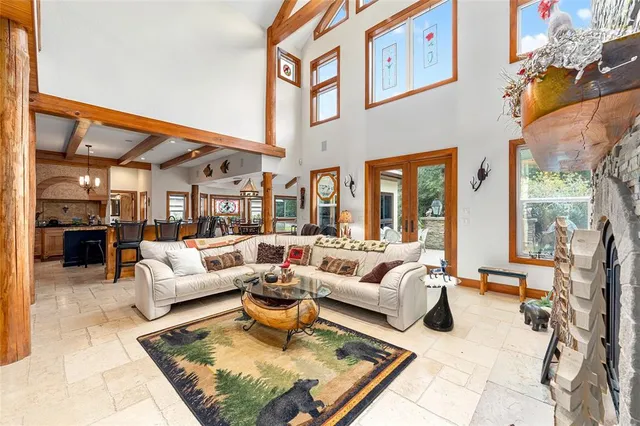 a view of a swimming pool with an outdoor space and seating area