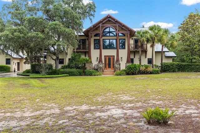 a view of house with outdoor space and porch