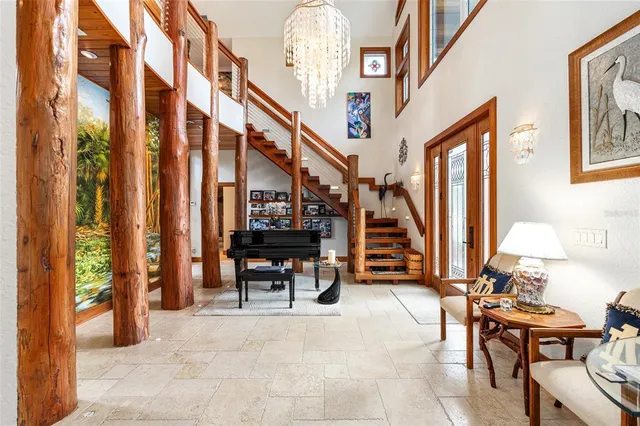 a view of a swimming pool with an outdoor space and seating area