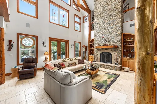 a bedroom with a large bed and a tv