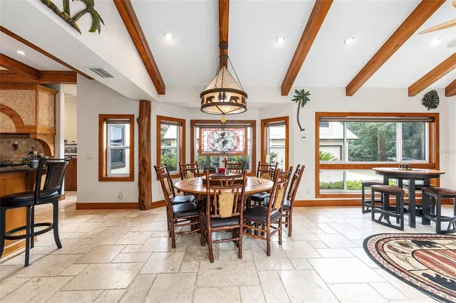 a living room with furniture a rug and a fireplace