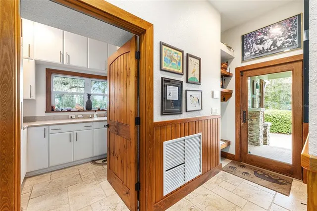 a bed room with a bed and a television